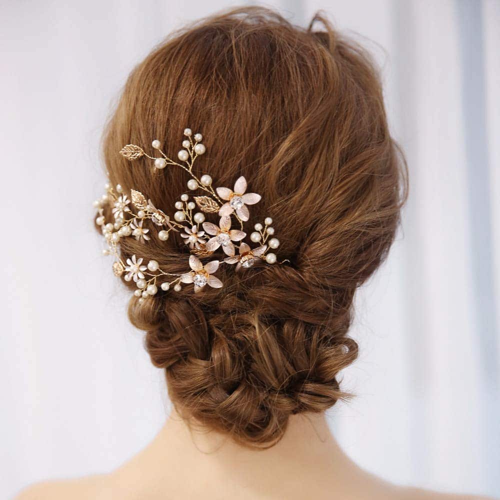 Rolled Updo with Floral Accessorie